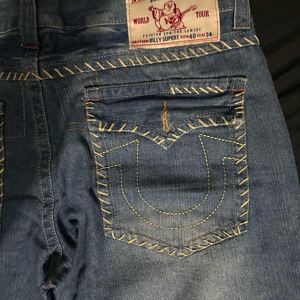 A pair of Vintage True Religion jeans that are still in mint condition